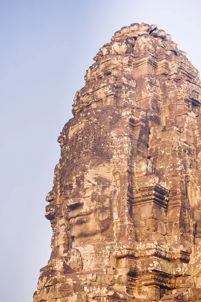 在古代巴戎寺吴哥城，柬埔寨石像的脸. — 图库照片