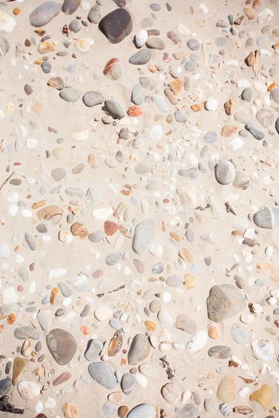 Close up of rounded and polished beach rocks — Stock Photo, Image