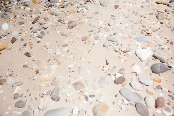 Primer plano de rocas de playa redondeadas y pulidas — Foto de Stock