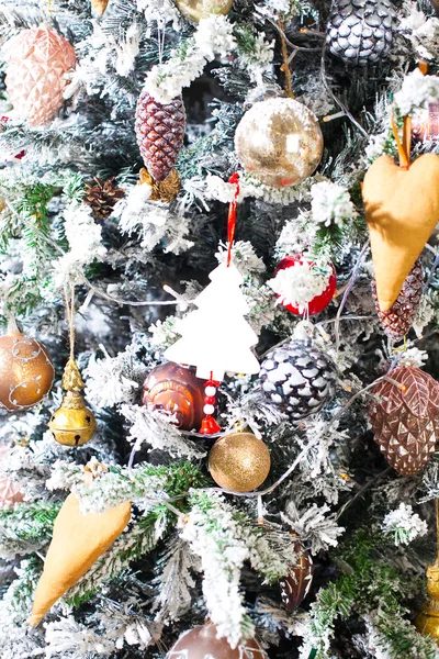 Decorated Christmas tree in red and white colors — Stock Photo, Image