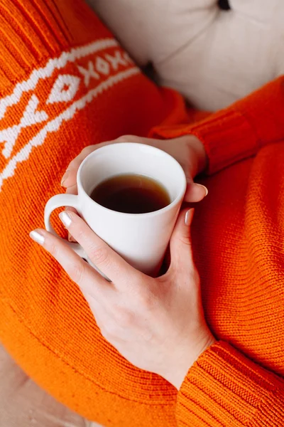 Woman on the bed with cup of tea — Stock Photo, Image