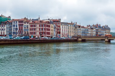 Old Houses along Nive River, Bayonne clipart