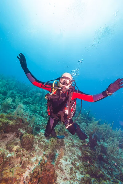 Happy young scuba diver — Stock Photo, Image