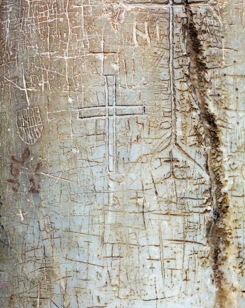 Ancient Signs on Column  of Holy Sepulcher Cathedral in Jerusale — Stock Photo, Image