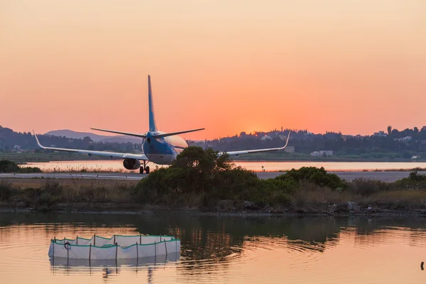 Airplane before take-off, evening scene, Corfu Stock Image