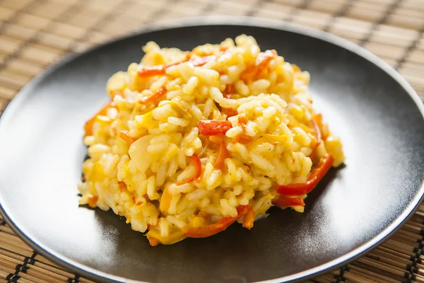 Risotto with red pepper, healthy vegan food — Stock Photo, Image
