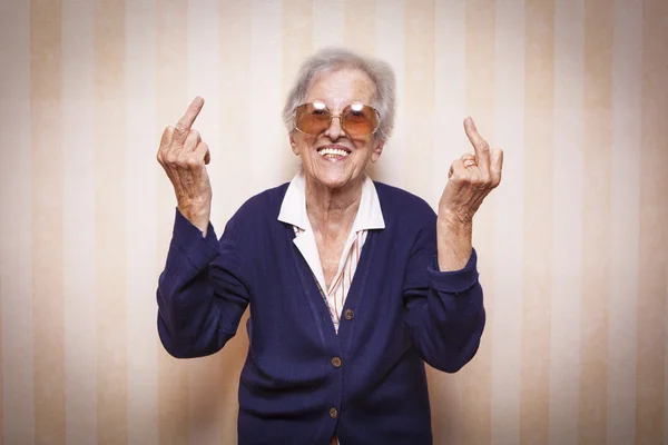 Lady making middle fingers signs Royalty Free Stock Images