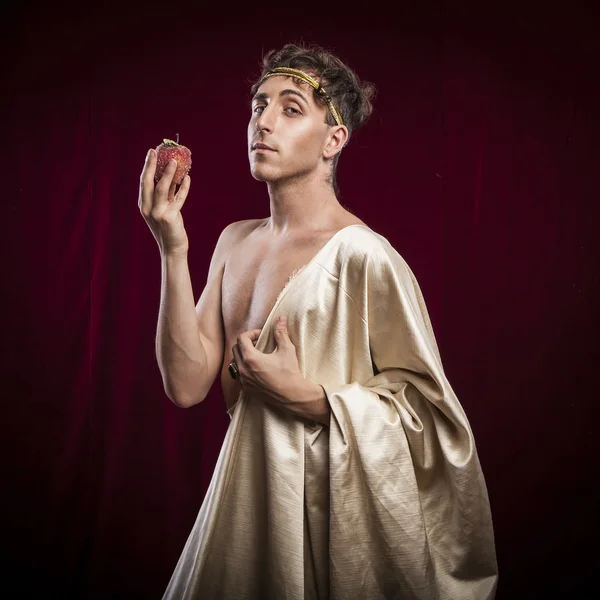 Romeinse man met appel in de hand — Stockfoto