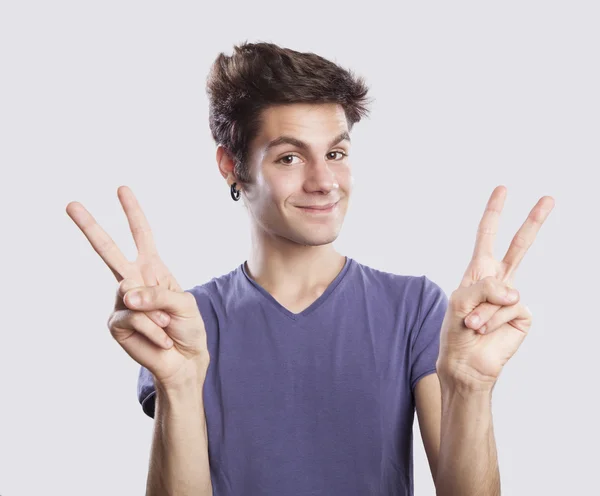 Man showing victory signs — Stock Photo, Image