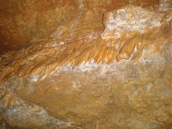 Steinmauer einer Höhle — Stockfoto