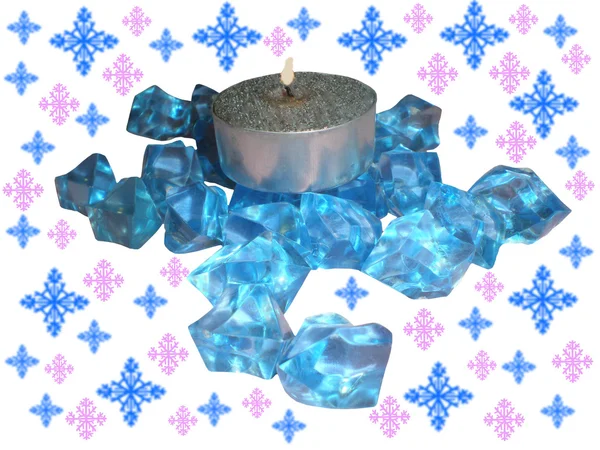 Gümüş mum ve mavi kristaller 