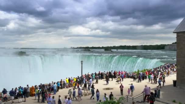 Tourists gather at an overlook at Niagara Falls — Stock Video