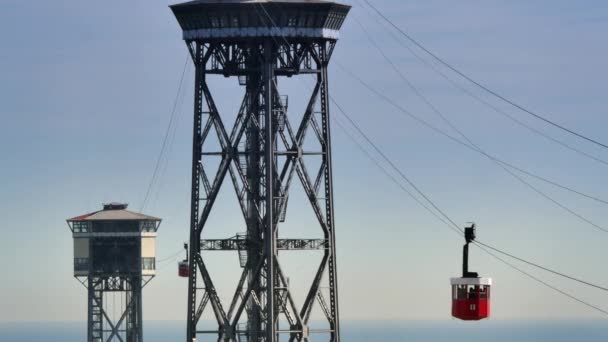 Transbordador cable car as it travels from Montjuïc  to the Barceloneta — Wideo stockowe