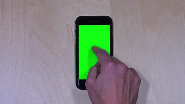 Overhead Green Screen Smartphone Demonstration — Stock Video