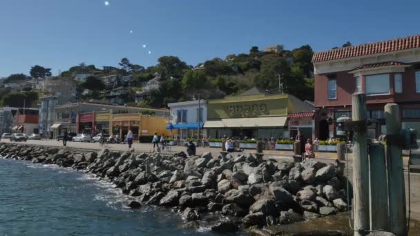 Bicyclists Ride into Downtown Sausalito California — Stock Video