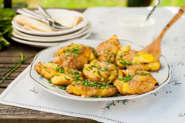 Patatas calientes australianas estrellarse con crema agria — Foto de Stock