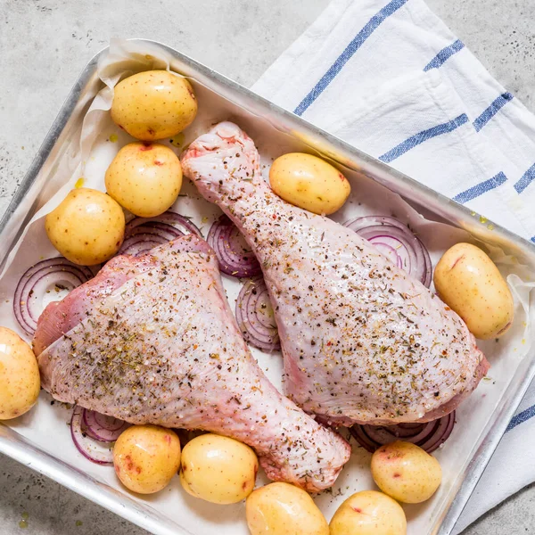 Two Uncooked Turkey Drumsticks Red Onion Potatoes Square — Stock Photo, Image