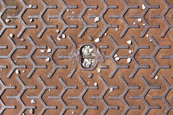 Arrugginito superficie metallica testurizzata con ciottoli — Foto Stock