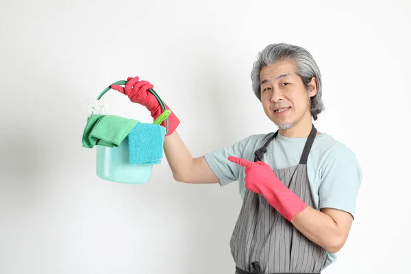 Senior Asian Housekeeper Standing White Background — Stock Photo, Image