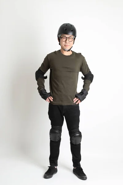 Asian Man Protective Gear Standing White Background — Stock Photo, Image