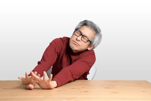 Senior Asian Man Sitting Desk White Background — Stock Photo, Image