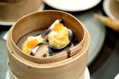 Masada servis edilen Çin yemeğinin adı Dim Sum..
