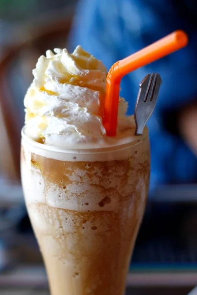 The blended coffee with whipped cream.