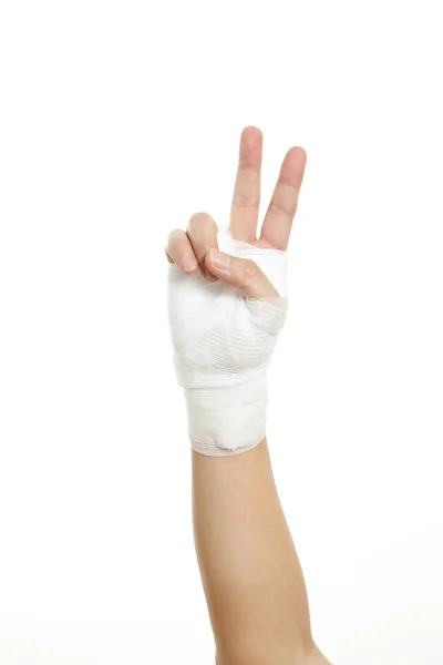 Människans Hand Med Bandage Den Vita Bakgrunden — Stockfoto