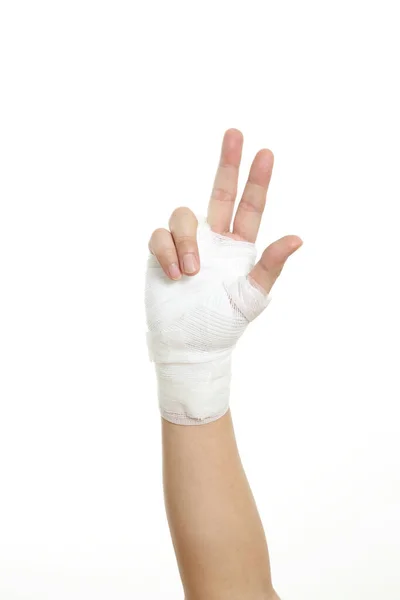 白地に包帯をした人間の手 — ストック写真