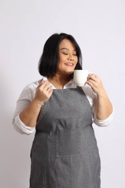 Önlüklü Asyalı kadın..