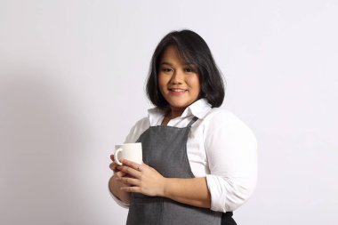 Önlüklü Asyalı kadın..