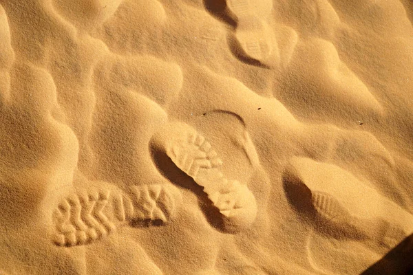 The many foot prints on beautiful red sand hill, the land mark of Mui Ne, Vietnam.