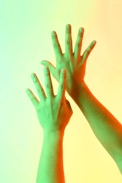 The Human hands posing on the white background.