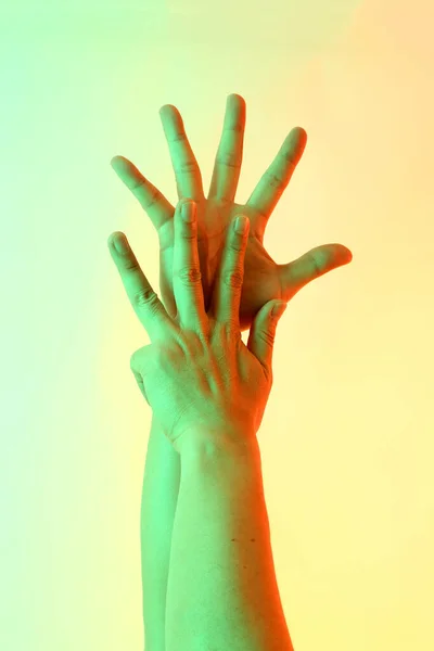 The Human hands posing on the white background.