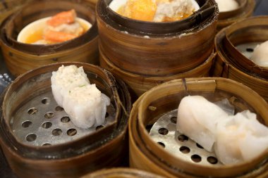 Çin yemekleri grubunun adı Dim Sum..