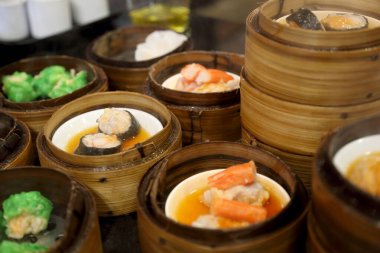 Çin yemekleri grubunun adı Dim Sum..