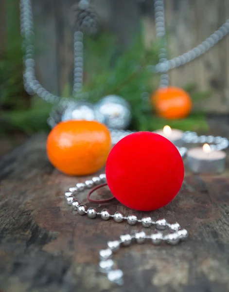 Christmas red ball on wooden background — Stock Photo, Image