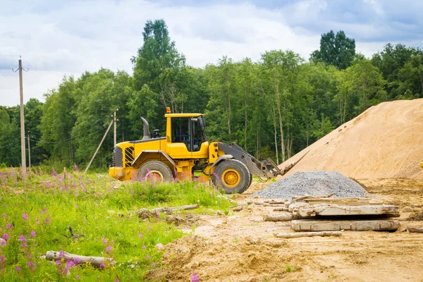 Yellow excavator at work — Stock Photo, Image