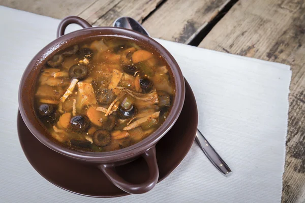 Traditional Russian meat soup with salty cucumbers