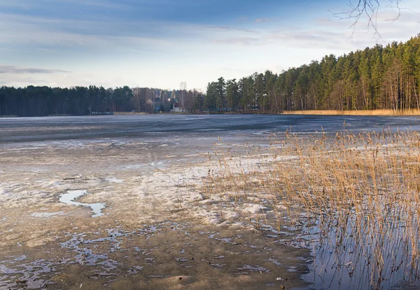 Early spring with melting ice and snow — Stock Photo, Image