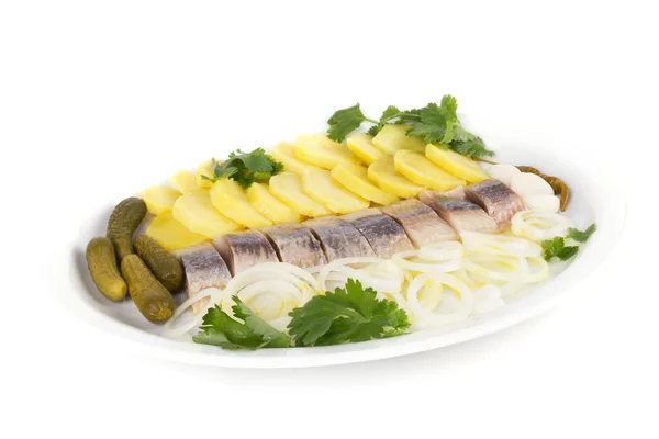 Porção de filetes de peixe de arenque com cebola de batata — Fotografia de Stock
