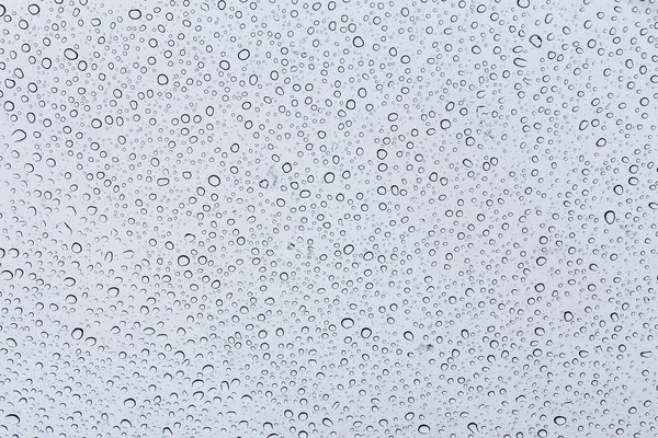 Gotas de agua en una ventana — Foto de Stock