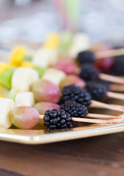 Fruits on a toothpick — Stock Photo, Image