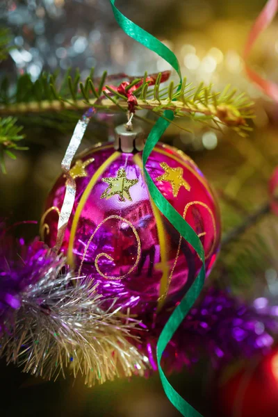 Christmas pink baubles on a tree — Stock Photo, Image