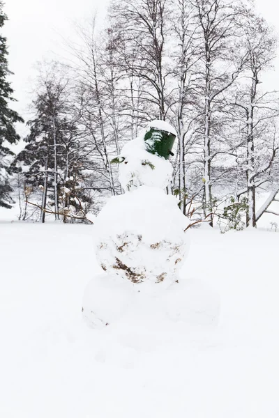 Snowman with bucket on the head — Stok fotoğraf