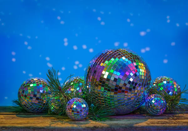 Christmas Mirror balls on wooden background — Stock Photo, Image