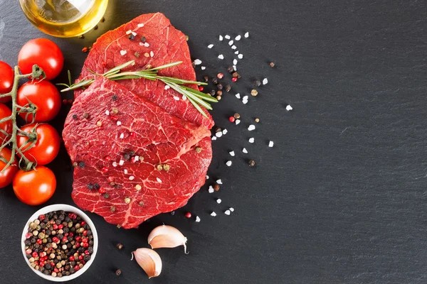 raw steak with spice