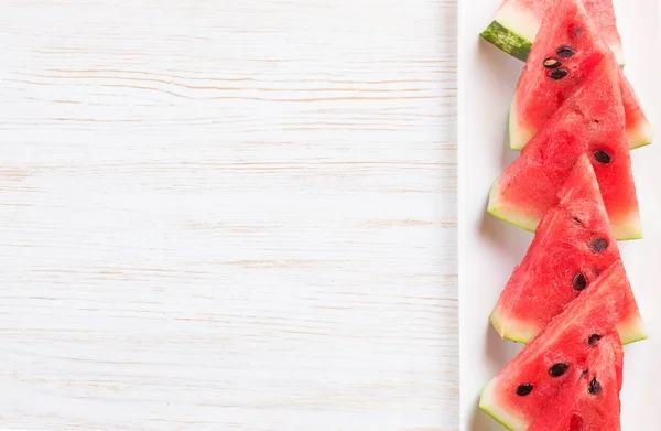 Watermeloen slices op de plaat — Stockfoto
