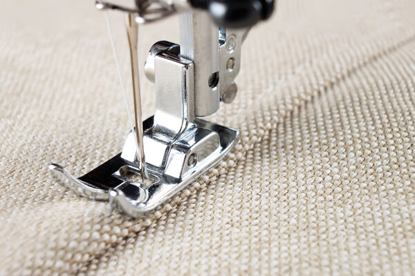 sewing machine foot and item of clothing