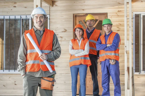 Tripulação de construção no local — Fotografia de Stock